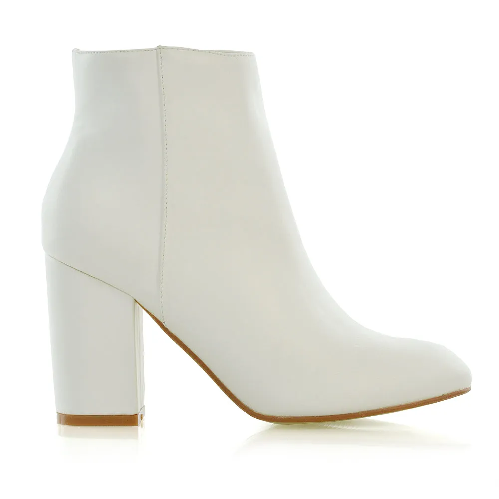 PEACHES CHUNKY BLOCK HIGH HEEL ZIP UP ANKLE WINTER BOOTS IN WHITE SYNTHETIC LEATHER