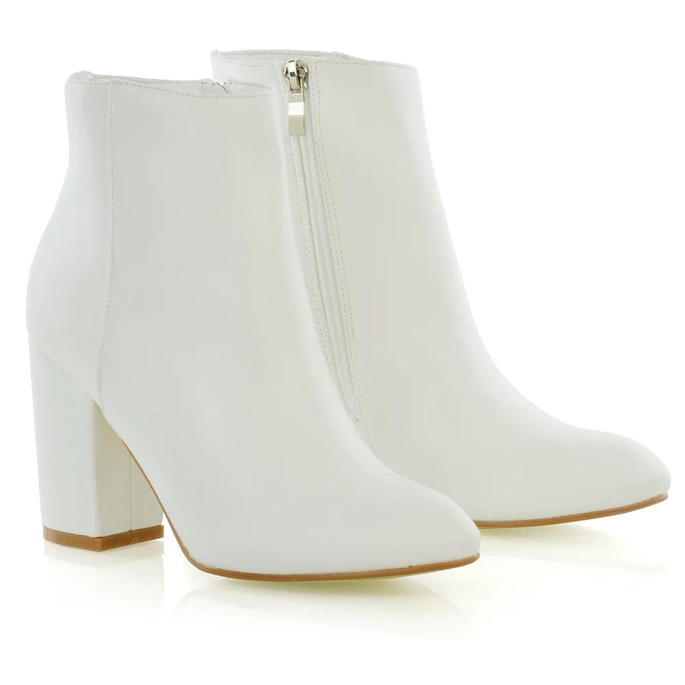 PEACHES CHUNKY BLOCK HIGH HEEL ZIP UP ANKLE WINTER BOOTS IN WHITE SYNTHETIC LEATHER